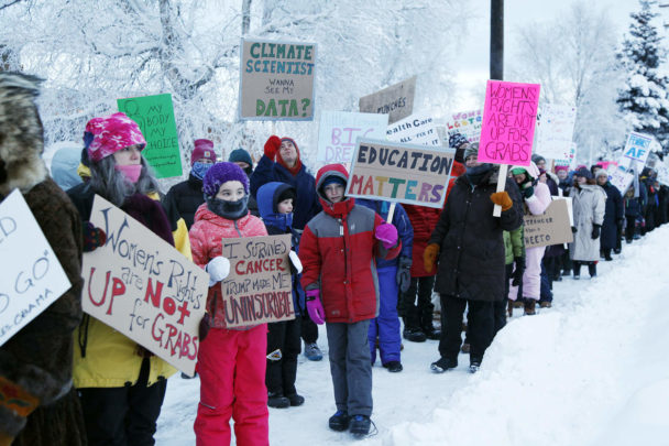 Fairbanksans march in the Farthest North Women's March on Washington Saturday, Jan. 21, 2017, in Fairbanks, Alaska, signs offered support for a myriad of issues: humanitarian rights, science, education, kidness, healthcare and more. Organizers estimate almost 2,000 men, women and children marched around a half-mile loop in temperatures that neared negative 20 to support values they feel may be threatened. Fairbanks, Alaska, Jan. 21, 2017. (Robin Wood/Fairbanks Daily News-Miner via AP) NYTCREDIT: Robin Wood/Fairbanks Daily News-Miner, via Associated Press